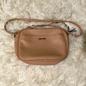 Pink Nine West hand bag.